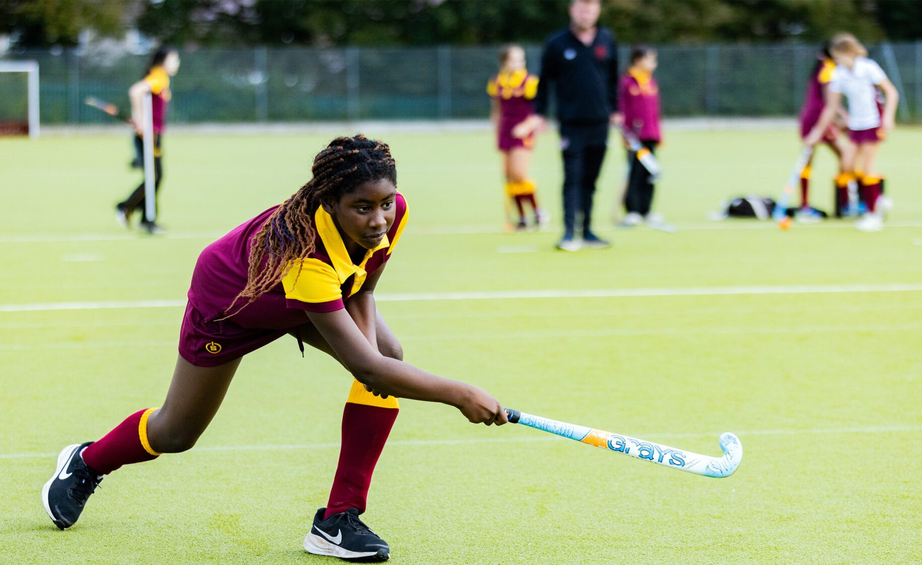 Hockey an der Downside School UK - eine der Sportarten, die von der renommierten Internatsschule in Großbritannien angeboten werden.